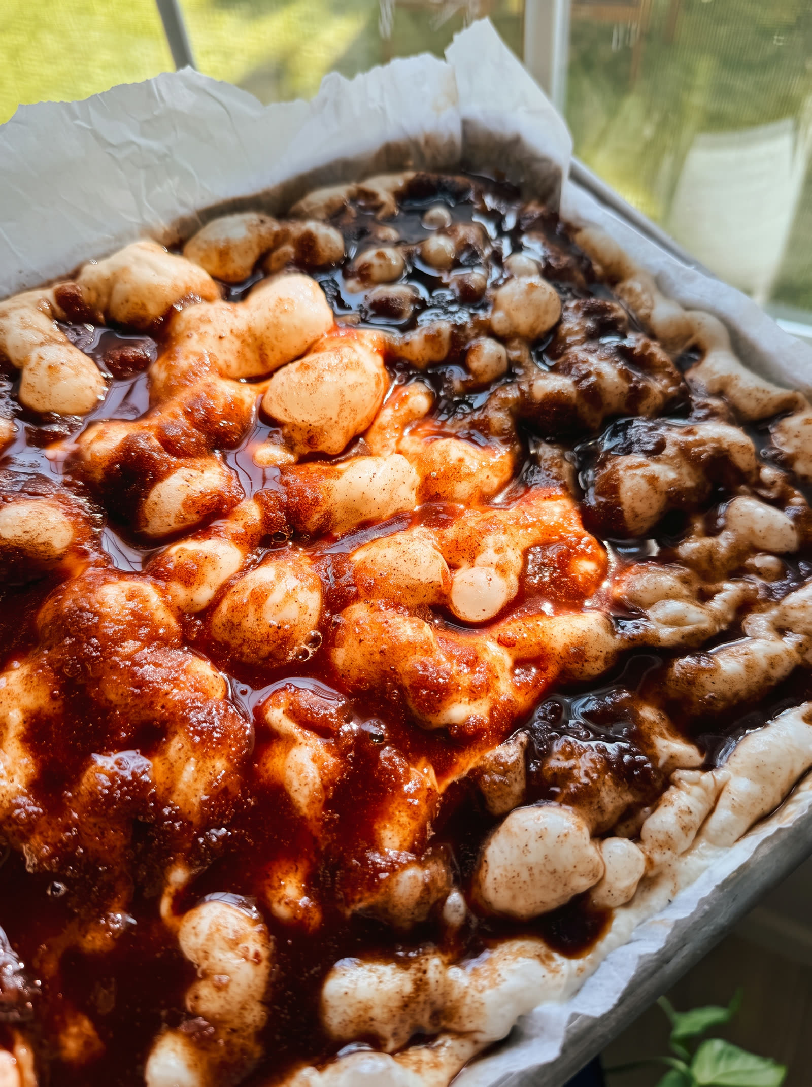 Cinnamon sugar swirled into focaccia dough before baking
